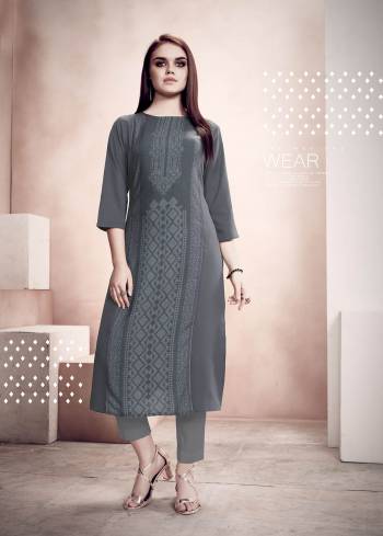 Here Is A Pretty Simple Readymade Kurti For Your Casual Wear In Grey Color. This Kurti Is Fabricated on Rayon Beautified With Prints. It Is Light Weight, Soft Towards Skin And Easy To Carry All Day Long. Also You Can Pair This Up Same Or Contrasting Colored Leggings or Pants. 