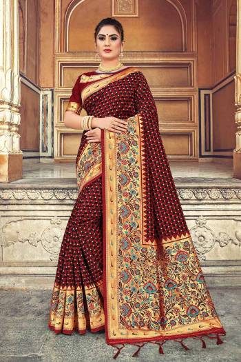 For A  Royal Look, Grab This Designer Weaved Saree In Maroon Color. This Saree And Blouse Are Silk Based Beautified With Heavy Weave. Its Fabric And Color Gives A Rich Look To Your Personality. 