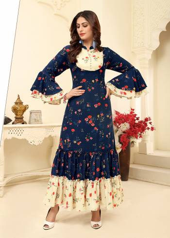 You Will Definitely Earn Lots Of Compliments Wearing This Readymade?Gown In Navy Blue Color. This Pretty Gown With Rich And Elegant Prints Is Fabricated on Rayon Which Is Soft Towards Skin and Easy To Carry All Day Long.?