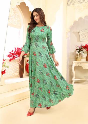 Flaunt Your Rich And Elegant Taste Wearing This Designer Readymade?Elegant Looking Gown In Rich Sea Green Color. This Gown Is Rayon Based Beautified With Prints All Over. Its Fabric Ensures Superb Comfort all Day Long, Buy Now.