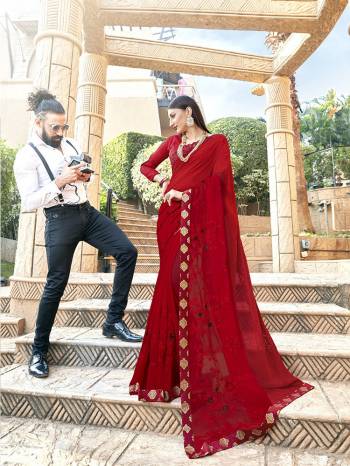Adorn The Pretty Angelic Look Wearing This Lovely Red Colored Saree Paired With Red Colored Blouse. This SareeIs Fabricated On Silk Gergette Paired With Art Silk Fabricated Blouse. Its Lovely Color And Rich Fabric Will Earn Yu Lots Of Compliments From Onlookers.