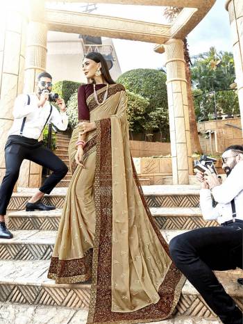 Shine Bright Wearing This Lovely Designer Saree In Beige Color Paired With Maroon Colored Blouse. This Pretty Saree Is Silk Georgette Based Paired With Art Silk Fabricated Blouse. It Is Beautified With Detailed Attractive Embroidery. Buy Now.