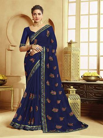 Catch All The Limelight At The Next Function You Attend Wearing This Pretty Designer Saree In Navy Blue Color. This Lovely Saree Is Fabricated On Georgette Paired With Art Silk Fabricated Blouse. It Is Beautified With Multi Colored Thread Work Givng An Attractive Look. Buy Now.