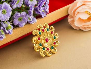 Here Is Royal Looking Designer Finger Ring In Golden Color Beautified With Stone Work. The Rich Golden Color And Pattern Will Give An Elegant Look To Your Hand, Buy Now