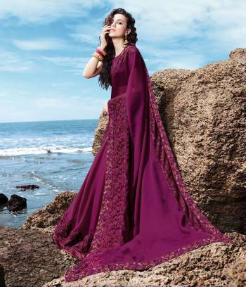 Grab This Beautiful Purple Colored Designer Saree Paired With Purple Colored Blouse. This Saree Is Fabricated On SatinGeorgette Paired With Art Silk Fabricated Blouse. Buy This Pretty Tone To Tone Embroidered Saree Now.