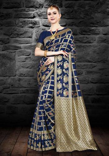 Enhance Your Personality In This Designer Silk Based Saree In Navy Blue Color Paired With Navy blue Colored Blouse. This Saree And Blouse Are Fabricated On Kanjivaram Art Silk Beautified With Weave All Over It.