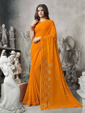 Celebrate This Festive Season With Beauty And Comfort Wearing This Pretty Elegant Designer Saree In Musturd Yellow Color. This Saree And Blouse Are Fabricated On Georgette Beautified With Jari Embroidery And Tone To Tone Resham Work. Buy Now.