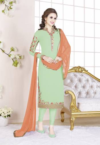 Add This Beautiful Designer Straight Suit To Your Wardrobe In Light Green Color Paired With Orange Colored Dupatta. Its Top Is Fabricated On Georgette Paired With Santoon Bottom And Chiffon Dupatta. Its Fabric Is Light In Weight And Easy To Carry All Day Long