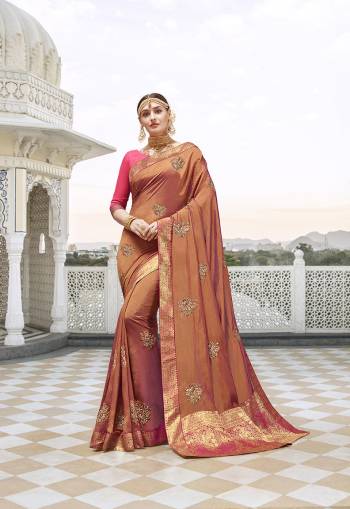 Attract All Wearing This Designer Saree In Rust Orange Color Paired With Contrasting Pink Colored Blouse. This Saree Is Fabricated On Satin Silk Paired With Art Silk Fabricated Blouse. It Is Beautified With Embroidered Motifs And Lace Border. 