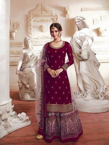 Look Pretty In This Heavy Designer Suit In Magenta Pink Colored Top Paired With Baby Pink Colored Bottom And Dupatta. Its Pretty Top Is Satin Georgette Based Paired With Net Fabricated Bottom And Dupatta. 