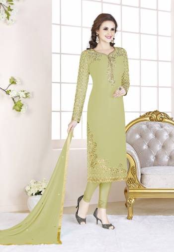 Add This Beautiful Designer Straight Suit To Your Wardrobe In All Over Pastel Green Color. Its Top Is Fabricated On Georgette Paired With Santoon Bottom And Chiffon Dupatta. Its Fabric Is Light In Weight And Easy To Carry All Day Long.