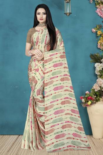 Here Is A Very Pretty Printed Saree For Your Semi-Casuals As Well As Festive Wear. This Lovely Saree And Blouse Are Fabricated On Satin Silk Beautified With Digital Prints. Also Its Fabric Is Soft Towards Skin And Easy To Carry All Day Long. 