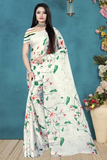 Here Is A Very Pretty Printed Saree For Your Semi-Casuals As Well As Festive Wear. This Lovely Saree And Blouse Are Fabricated On Satin Silk Beautified With Digital Prints. Also Its Fabric Is Soft Towards Skin And Easy To Carry All Day Long. 