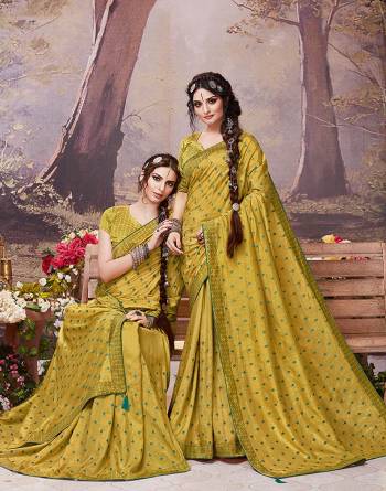 Enhance Your Personality Wearing This Designer Elegant Looking Saree In Pear Green Color. This Pretty Saree And Blouse Are Silk Based Beautified With Pretty Intricate Embroidered Butti. Also Its Rich Fabric And Color Will Earn You Lots Of Compliments From Onlookers. 