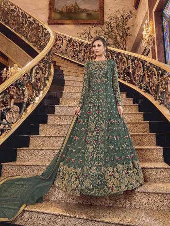 Wear This Heavy Designer suit In Two Looks With This Beautiful Teal Green Colored Floor Length Suit Paired With A Net Fabricated Embroidered Jacket, Art Silk Fabricated Bottom And Net Fabricated Dupatta. You Can Wear This With Or Without Jacket As Per The Ocaasion. 