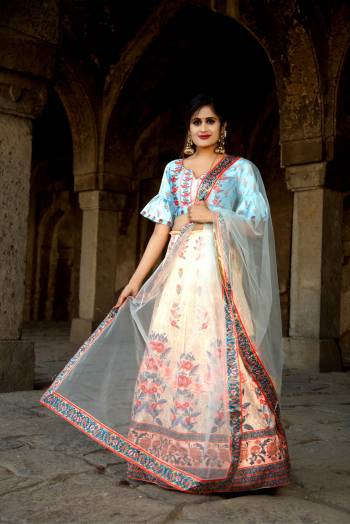 Look Pretty In This Designer Sky Blue & Peach Colored Lehenga Choli. Its Lovely Digital Printed Blouse And Lehenga Are Satin Based Paired With Red Fabricated Dupatta. Buy This Pretty Piece Now.