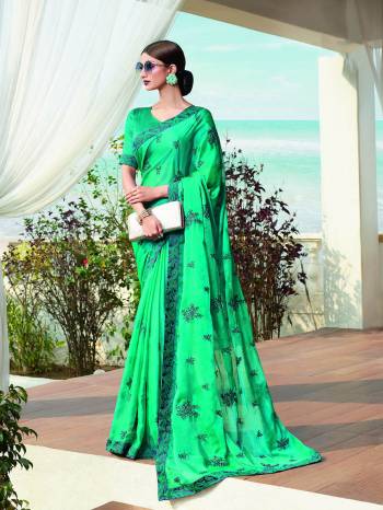 Catch All The Limelight Wearing This Bright And Appealing Designer Saree In Turquoise Blue Color. This Saree IS Chinon Based Paired With Art Silk Fabricated Blouse. Buy this Lovely Piece Now.