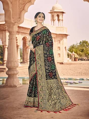 Celebrate This Festive And Wedding Season With This Heavy Designer Saree In Black Which Comes With Two Designer Blouses, One Simple Plain Blouse And Another Designer Embroidered Blouse. This Pretty Saree Is Fabricated On Jacquard Silk Paired With Art Silk Fabricated Blouses.