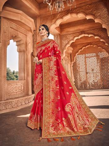 Here Is A Very Pretty Heavy Designer Saree Which Comes With Two Blouses. This Beautiful Red Colored Heavy Embroidered Saree Is Fabricated On Jacquard Silk Paired With A Plain Art Silk Blouse And Another Embroidered Art Silk Fabricated Blouse. Buy This Pretty Saree Now.