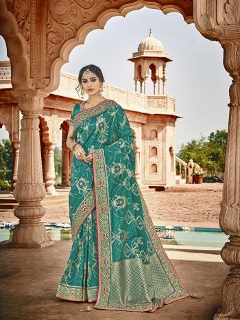 Celebrate This Festive And Wedding Season With This Heavy Designer Saree In Blue Which Comes With Two Designer Blouses, One Simple Plain Blouse And Another Designer Embroidered Blouse. This Pretty Saree Is Fabricated On Jacquard Silk Paired With Art Silk Fabricated Blouses.