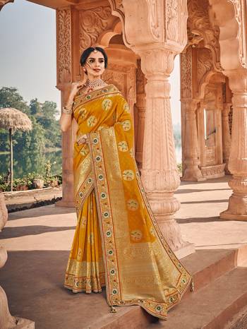 Here Is A Very Pretty Heavy Designer Saree Which Comes With Two Blouses. This Beautiful Musturd Yellow Colored Heavy Embroidered Saree Is Fabricated On Jacquard Silk Paired With A Plain Art Silk Blouse And Another Embroidered Art Silk Fabricated Blouse. Buy This Pretty Saree Now.