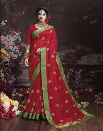 Get Ready For The Upcoming Wedding And Festive Season With This Designer Saree In Red Color. This Attractive Jari Embroidered Saree Is Fabricated On Vichitra Silk Paired With Vichitra Silk Fabricated Blouse. It Is Beautified With Broad Lace Border With Stone Work. Buy Now.