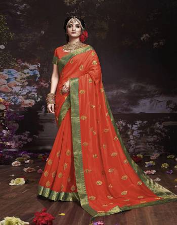 Get Ready For The Upcoming Wedding And Festive Season With This Designer Saree In Orange Color. This Attractive Jari Embroidered Saree Is Fabricated On Vichitra Silk Paired With Vichitra Silk Fabricated Blouse. It Is Beautified With Broad Lace Border With Stone Work. Buy Now.