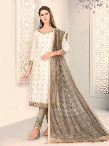 Add This Lovely Rich And Elegant Looking Chanderi Silk Based Designer Straight Suit To Your Wardrobe In White Color. Its Rich Fabric And Unique Color Pallete Will Definitely Earn You Lots Of Compliments From Onlookers. 