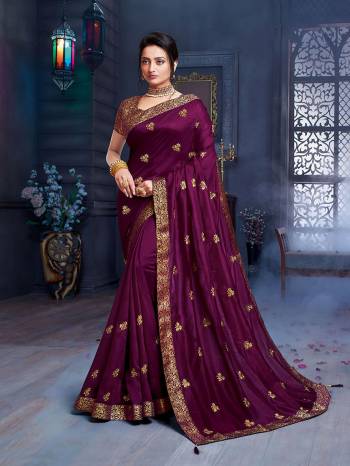 Grab This Pretty Attractive Saree In Dark Purple Color. This Saree Is Fabricated On Art Silk Paired With Brocade Fabricated Blouse. Its Rich Fabric And Color Will Earn You Lots Of Compliments From Onlookers.