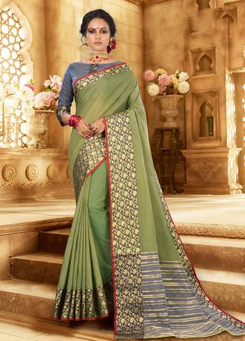 Flaunt Your Rich And Elagant Taste Wearing This Pretty Attractive Saree In Light Green Color Paired With Contrasting Grey Colored Blouse. This Saree And Blouse Are Fabricated On Khadi Silk Which Also Gives A Rich Look To Your Personality. Buy Now.