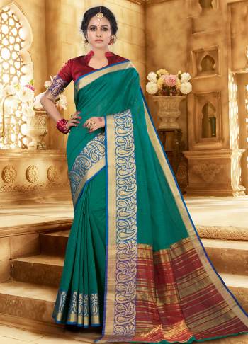 Flaunt Your Rich And Elagant Taste Wearing This Pretty Attractive Saree In Teal Green Color Paired With Contrasting Maroon Colored Blouse. This Saree And Blouse Are Fabricated On Khadi Silk Which Also Gives A Rich Look To Your Personality. Buy Now.