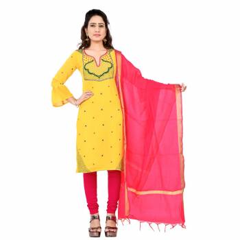 Grab This Pretty Simple Dress Material In Yelow Colored Top Paired With Contrasting Dark Pink Colored bottom And Dupatta. Its Embroidered Top Is Georgette Based Paired With Cotton Bottom And Chanderi Dupatta. Buy This Dress Material Now. 