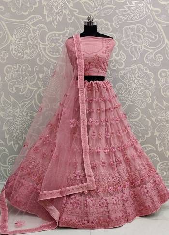 Here Is A Very Pretty Heavy Designer Lehenga Choli For The Bridesmaid In This Lovely Pink Color. This Detailed Embroidered Lehenga Choli And Dupatta Are Fabricated On Net Which Is Light Weight, Durable And Gives A Pretty Look The Personality. Buy This Pretty Piece Now.