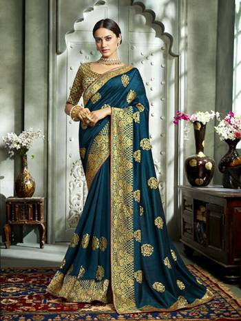 Grab This Pretty Attractive Saree In Cobalt Blue Color. This Saree?Is Fabricated On Art Silk Paired With Brocade Fabricated Blouse. It Has Attractive Jari Embroidered Motifs With Detailed Weaved Broad Border. Its Rich Fabric And Color Will Earn You Lots Of Compliments From Onlookers.