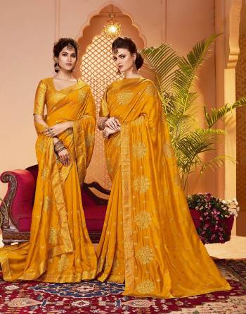 Grab This Pretty Attractive Saree In Musturd Yellow Color. This Saree Is?Fabricated On Soft Art Silk Paired With Brocade Fabricated Blouse. It Has Attractive Jari Embroidered Motifs Highlited With Stone Work. Its Rich Fabric And Color Will Earn You Lots Of Compliments From Onlookers.