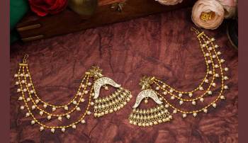 Grab This Heavy Designer Earrings For The Upcoming Wedding Season. The New Trendy And Designer Earrings Can Be Paired With Any Kind Of Ethnic Attire. Also It Will Earn You Lots Of Compliments From Onlookers. 