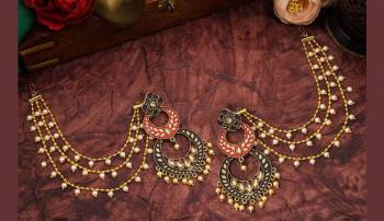 Grab This Heavy Designer Earrings For The Upcoming Wedding Season. The New Trendy And Designer Earrings Can Be Paired With Any Kind Of Ethnic Attire. Also It Will Earn You Lots Of Compliments From Onlookers. 