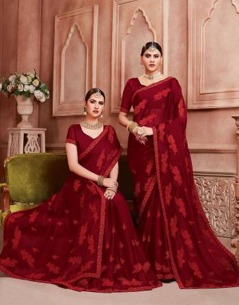 Enhance Your Personality Wearing This Designer Saree In Maroon Color. This Pretty Resham Embroidered Saree Is Fabricated On Chiffon Paired With Art Silk Fabricated Blouse. It Is Highlited With Pretty Stone Work Which Gives An Attractive Yet Elegant Look.