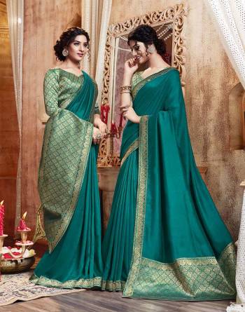 Add Some Rich And Elegant looking Simple Yet Designer Saree In Turquoise Blue Color. This Saree Is Fabricated On Art Silk Paired with Jacquard Silk Fabricated Blouse. Buy Now.