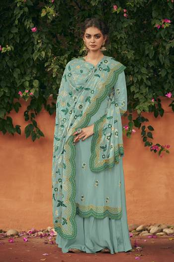 Add This Very Beautiful Designer Straight Suit To Your Wardrobe In Blue Color. Its Pretty Embroidered Top And Dupatta Are Fabricated On Italian Silk Paired With Santoon Fabricated Bottom. Buy This Semi-Stitched Suit Now.