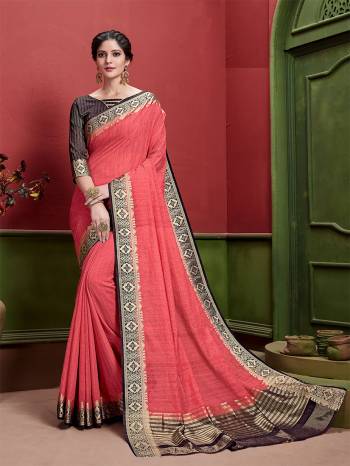 Celebrate This Festive Season Wearing This Rich And Elegant Looking Saree In Dark Peach Color Paired With Contrasting Brown Colored Blouse. This Saree And Blouse Are Fabricated On Art Silk Beautified With Weave. 