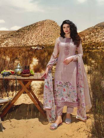 Celebrate This Festive Season With Beauty And Comfort Wearing This Designer Straight Suit In All Over Light Mauve Color. This Suit Is Crepe Based Paired With Chiffon Fabricated Dupatta. It Is Beautified With Floral Prints And Embroidery Giving It An Attractive Look.