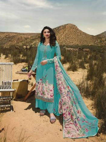 Rich And Elegant Looking Designer Straight Suit IS Here In All Over Turquoise Blue Color. Its Beautiful Top And Bottom Are Fabricated On Crepe Paired With Chiffon Fabricated Dupatta. Its Fabric Is Light Weight, Soft Towards Skin And Easy To Carry All Day Long. 