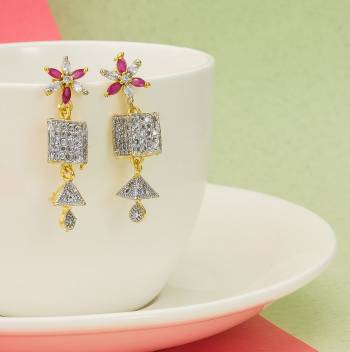 Grab This Pretty Earrings Set In Golden Color. This Lovely Design Is Beautified With Attractive Diamond Work. You Can Pair This Up With Any Colored Attire. Buy This Pretty Piece Now