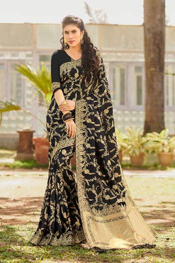 Enhance Your Personality Wearing This Rich Looking Saree In Black Color. This Saree And Blouse Are Silk Based Beautified With Attractive Weave All Over. It Is Light Weight, Durable And Easy To Care For.