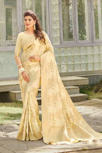 For A Proper Traditional Look, Grab This Designer Silk Based Saree In Cream Color. This Saree And Blouse Are Fabricated On Art Silk. It Is Beautified With Heavy Weave All Over. 