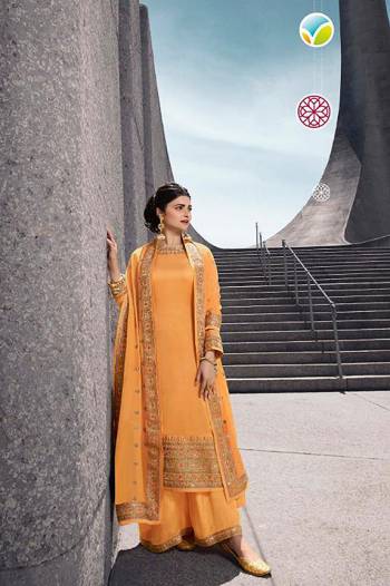 Enhance Your Personality Wearing This Elegant Embroidered Designer Straight Suit In Yellow Color. Its Top Is Fabricated On Satin Georgette Paired With Santoon Bottom And Silk Georgette Dupatta. Its Rich Fabric And Color Will Definitely Earn You Lots Of Compliments From Onlookers. 