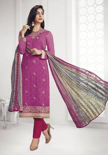 For Your Semi-Casual Wear, Grab This Designer Straight Suit In Magenta Pink And Multi Color. Its Embroidred Top Is Fabricated On Georgette Paired With Santoon Bottom And Satin Based Dupatta. This Pretty Suit Is Light In Weight And Easy To Carry All Day Long. 