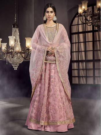 Look Pretty In This Designer Indo-Western Suit In Pink Color. Its Top Embroidere Top and Dupatta Are Fabricated On Net Paired With Satin Fabricated Skirt. Buy This Semi-Stitched Indo-Western Suit Now.