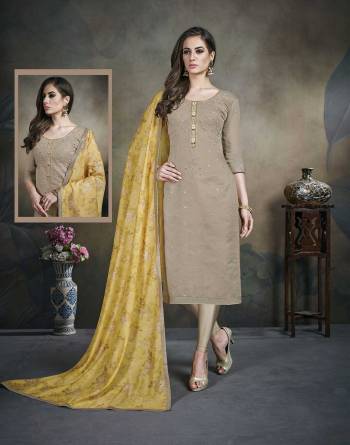 Flaunt Your Rich And Elegant Taste Wearing This Designer Straight Suit In Beige Color Paired With Yellow Colored Dupatta. Its Top Is Fabricated On Modal Silk Paired With Cotton Bottom And Digital Printed Dupatta. 